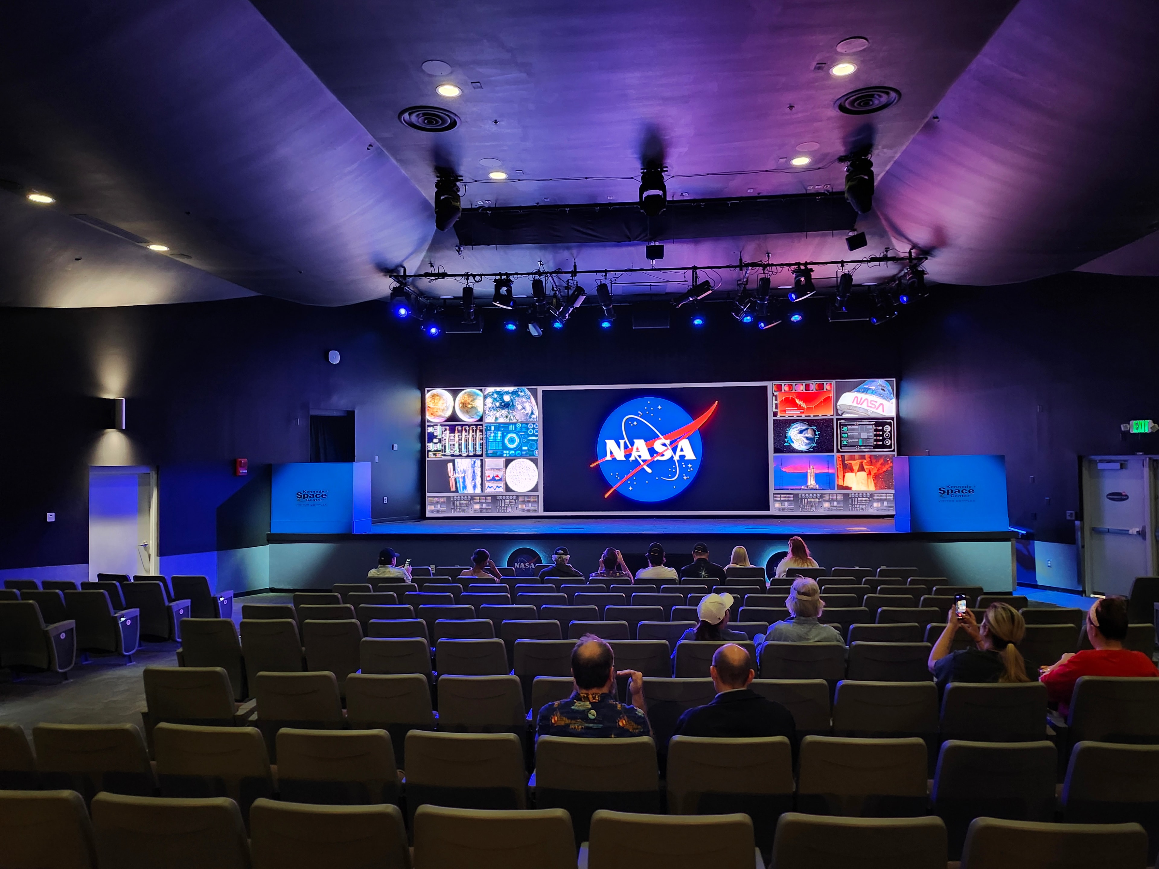 Kennedy Space Center LED display showing NASA logo and space-themed content